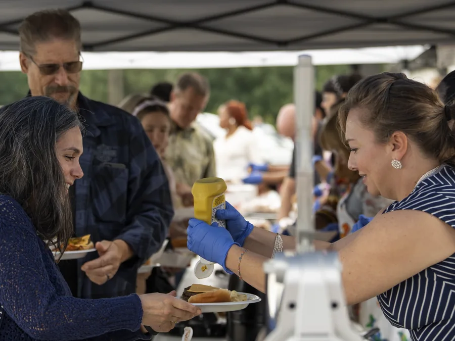 Serving food at a Mission View Baptist cookout